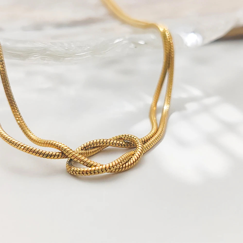 Manco elegante minimalista jóias lustre 14k banhado a ouro atado cobra corrente colar feminino acessórios de aço inoxidável